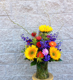 Wow somebody with this dramatic arrangement of sunflowers, delphinium, gerbera, dahlias and curly willow. Made fresh in our Toronto- North York flower shop by our talented designers. We cover all of Toronto and area daily.