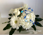 White roses, hydrangea and gerbera with blue stars. We can deliver in the Toronto, Don Mills, North York, Vaughan and Markham areas as all of the " GTA ." 