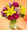 Celebrate Happy Times - past, present and future. Yellow Asiatic lilies and purple daisy poms are sprinkled with mini carnations and lavender monte casino and arranged in a clear glass vase. It's the perfect birthday gift!