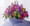 The full spectrum of purple flowers, gathered in a basket. Delivered from our flower shop in Toronto North York. Serving Toronto, Willowdale, North York, Don Mills, Thornhill, Richmond Hill, Markham, Ajax, Burlington and area.