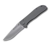 CRKT Drifter Stainless Handle Gray Scales Plain Edge (6450S) - The CRKT Drifter has very sharp edge that is perfect for personalized engraving of medals and trophies and imprinting of logos. It is a little knife with a stainless steel handle that has a great contour and texture for sturdy gripping in all weather, with or without gloves.  The CRKT Drifter has a plain edge designed blade that is easy to sharpen. The frames have finishing touches of titanium nitride ideally suited for imprinting.  The CRKT Drifter is very solid and tough from its blade and frame to its clip and lock thus giving your work a smooth finish. It is lightweight in the pocket and is good for everyday-carry anywhere in the world. This knife is very easy to clean and open/close even with one hand.
