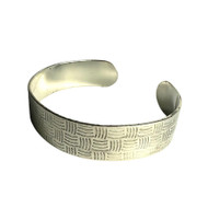 Heavy silver textured bangle.