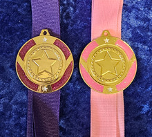 purple and pink glitter medals