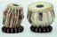 Tabla sheesham wood with brass nickeled Doogi, Special straps and skins on both, with ring set, hammer & standard bag.