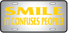 Smile Confuses Auto Plate