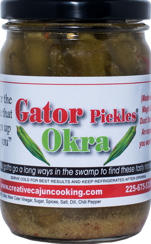 So even if you don’t like Okra, I have a great track record of turning those okra haters into okra lovers. They have the same great taste as the pickles in an okra pod. They make great Bloody Marys’ and when you pour the juice in a Martini it becomes a Dirty Martini. They also work great on that fabulous pickle and cheese tray for those special guest you have.
A sweet and flavorful pickled okra with the "bite that slips up on you"
Made with real Magic Swamp Dust Seasoning.
An experience you won't forget!