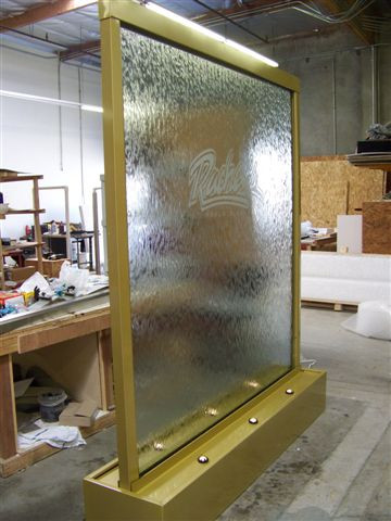 Custom Glass Waterfall with Gold Frame