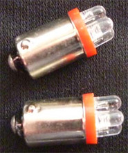 Red LED BA9S Bayonet Base Globe with Four LED Diodes. 24 Volt Only. Pair.