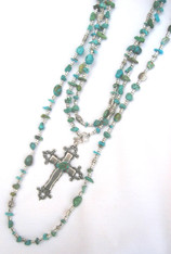 Each necklace is a mix of Genuine Turquoise in all shapes and sizes.
Wear long or short. 36" long with detachable cross.
Shown here:
1 36" neck with cross doubled
1 36" mix neck
