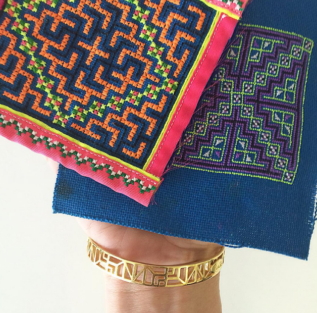 Our Bokeo bracelet next to the embroidery that inspired its patterning