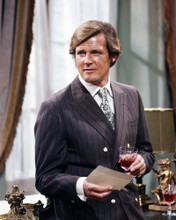 ROGER MOORE THE PERSUADERS IN SUIT HOLDING WINE GLASS PRINTS AND POSTERS 288388