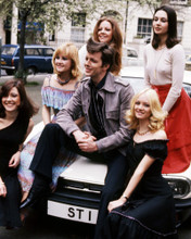 IAN OGILVY RETURN OF THE SAINT POSING ON VOLVO WITH BEAUTIFUL GIRLS PRINTS AND POSTERS 288351