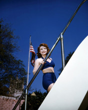 JOAN LESLIE BIKINI POSE BY AMERICAN FLAG FROM ORIGINAL TRANSPARENCY PRINTS AND POSTERS 287251