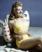 BETTY GRABLE IN YELLOW BIKINI STRIKING 1940'S GLAMOUR POSE PRINTS AND POSTERS 286321