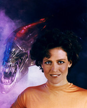 SIGOURNEY WEAVER ALIENS POSING BY GIANT ALIEN HEAD PRINTS AND POSTERS 284939