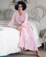 ELIZABETH TAYLOR PINK ROBE ON EDGE OF BED PRINTS AND POSTERS 284831