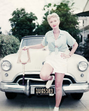 CELESTE HOLM IN WHITE SHORTS POSING BY CLASSIC CAR PRINTS AND POSTERS 284815