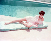 JOAN COLLINS LYING BY POOL PRINTS AND POSTERS 266310