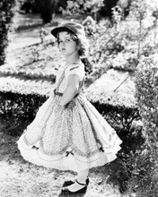 SHIRLEY TEMPLE WEARING CAP AND DRESS IN GARDEN PRINTS AND POSTERS 197169