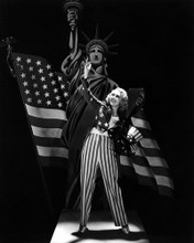 JOAN BLONDELL PSOING BY STATUE OF LIBERTY US AMERICAN FLAG PRINTS AND POSTERS 196946