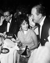 ELIZABETH TAYLOR WITH BANDAGE ON NECK CANDID AT PARTY JOHN WAYNE PRINTS AND POSTERS 194817