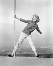 SANDRA DEE HOLDING ONTO POLE BY HILLTOP PRINTS AND POSTERS 193513
