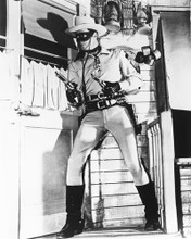 CLAYTON MOORE LONE RANGER HOLDING 2 GUNS PRINTS AND POSTERS 175547