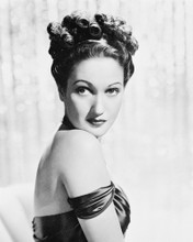 DOROTHY LAMOUR LOOKS OVER BARE SHOULDER PRINTS AND POSTERS 168589