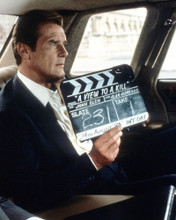 A VIEW TO A KILL ROGER MOORE ON SET RARE PRINTS AND POSTERS 282732