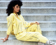BETSY RUSSELL YELLOW OUTFIT POSING ON STEPS AVENGING ANGEL PRINTS AND POSTERS 290249