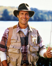 CHEVY CHASE THE GREAT OUTDOORS POSING WITH FISHING ROD PRINTS AND POSTERS 290380