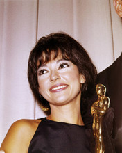 RITA MORENO HOLDING ACADEMY AWARD OSCAR STATUE FOR WEST SIDE STORY PRINTS AND POSTERS 290848