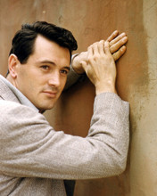 ROCK HUDSON IN SUIT POSING BY WALL 1960'S PHTO SHOOT PRINTS AND POSTERS 291224
