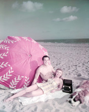 ROCK HUDSON BARECHESTED ON BEACH WITH STARLET PRINTS AND POSTERS 291425
