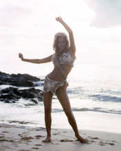 RAQUEL WELCH ONE MILLION YEARS B.C. BAREFOOT ON BEACH IN BIKINI POSE PRINTS AND POSTERS 291399