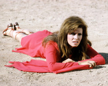 RAQUEL WELCH FATHOM RED DRESS LYING ON GROUND PRINTS AND POSTERS 291412