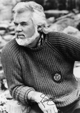 Kenny Rogers 5x7 inch photo 1980's pose in sweater with facsimile signature