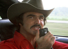Smokey and the Bandit Burt Reynolds talks on CB radio 5x7 inch photograph
