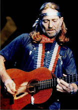 Willie Nelson 5x7 inch press photo playing his Trigger guitar on stage