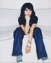 Ashlee Simpson full length publicity pose seated wearing blue jeans 8x10 photo
