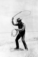 James Dean on set of Giant practicising lassoo with rope 8x12 inch real photo