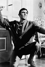 George Lazenby as 007 On Her Majesty's Secret Service throws knife 8x12 photo