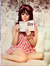 Natalie Wood in low cut neglige sitting on bed Penelope 1966 8x12 inch photo