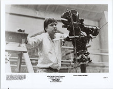 Terry Gilliam on set filming Brazil posing with camera 5x7 inch publicity photo