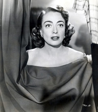 Joan Crawford covering herself as she changes behind curtain 5x7 photo