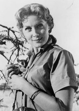 Rhonda Fleming holds small creature in portrait from 1956 Odongo 5x7 inch photo