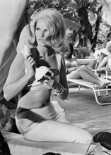 Jean Hale in two piece outfit holding phone In Like Flint 5x7 inch photo