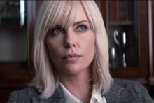 Charlize Theron in grey suit & white blouse Atomic Blonde 4x6 inch photo