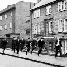 A Hard Day's Night The Beatles being chased down street by police 12x12 photo