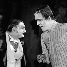 The Munsters on set Al Lewis chats between takes with Fred Gwynne 12x12 photo